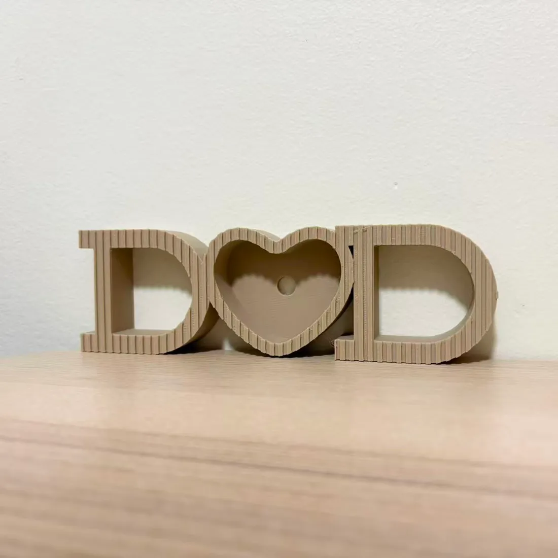 Peça decorativa DAD com coração